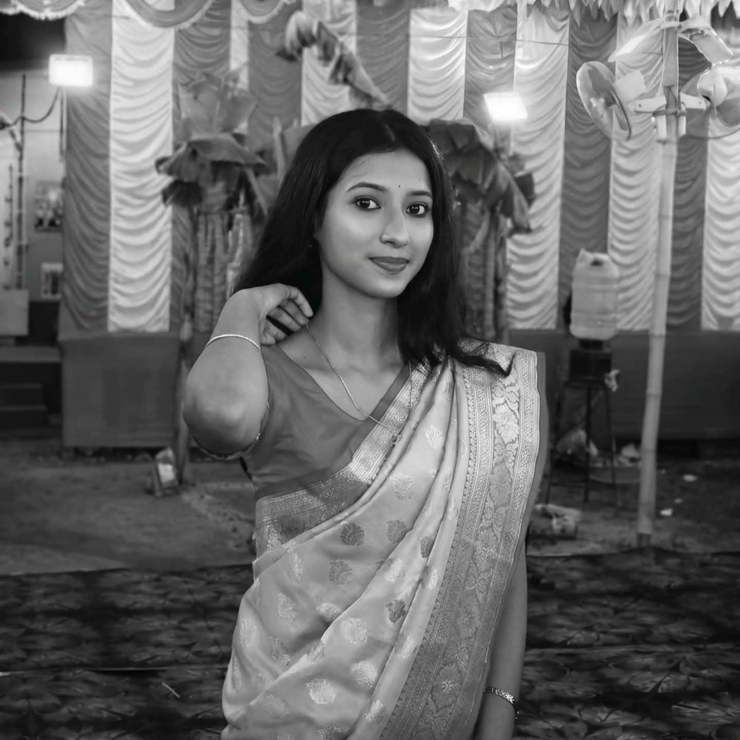 Artist and founder Snigdha Chakraborty in sari portrait